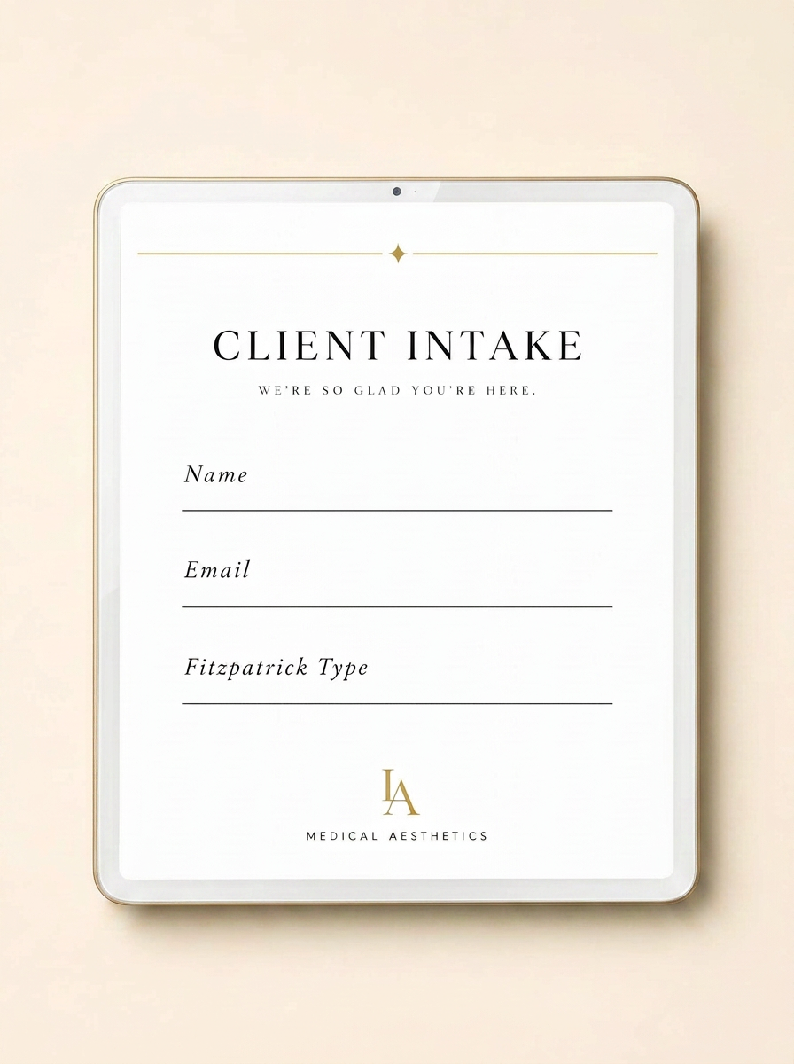 Clinic intake tablet showing Name, Email, and Fitzpatrick Type fields